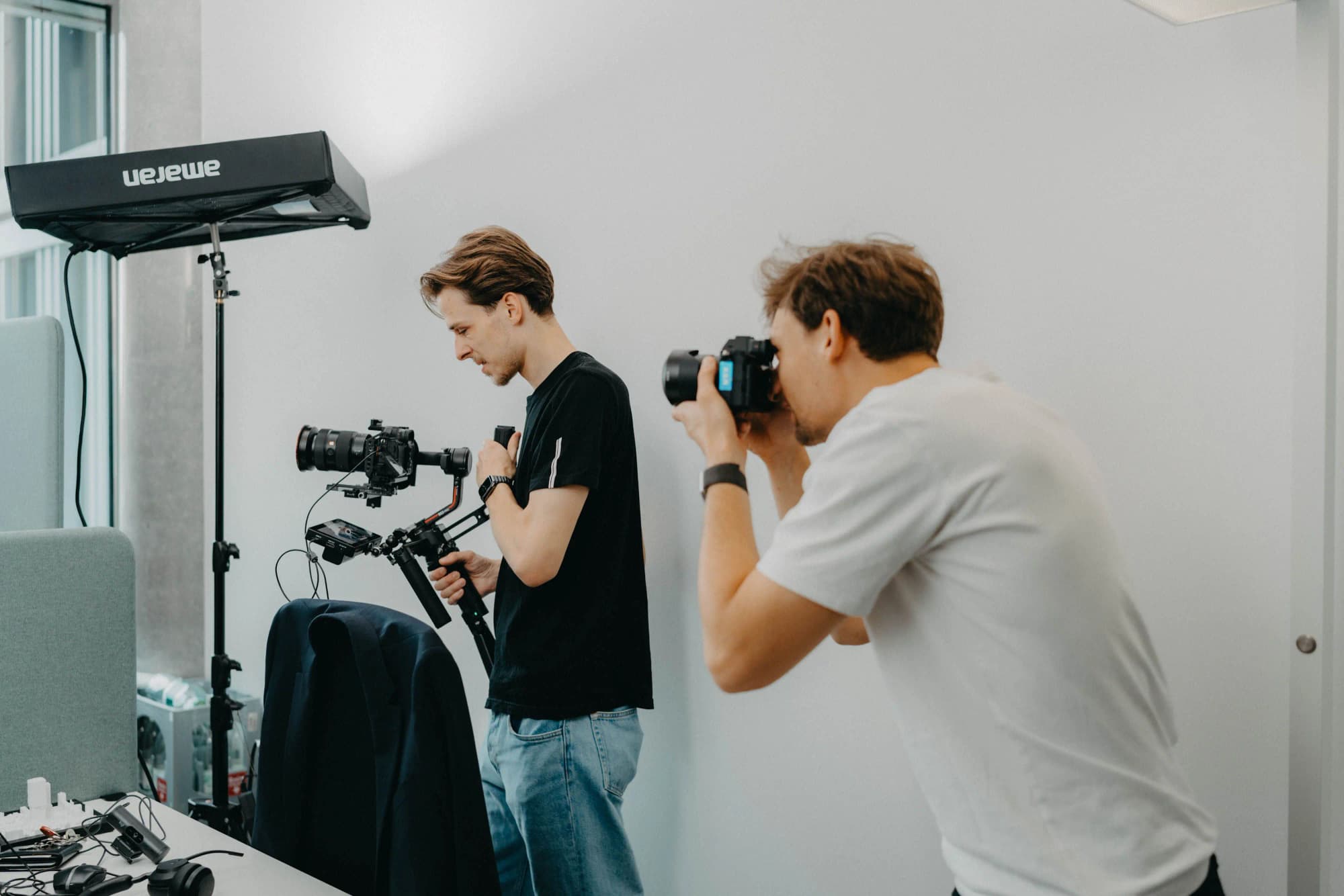 VAP behind the scenes: camera team filming portraits in the meeting room