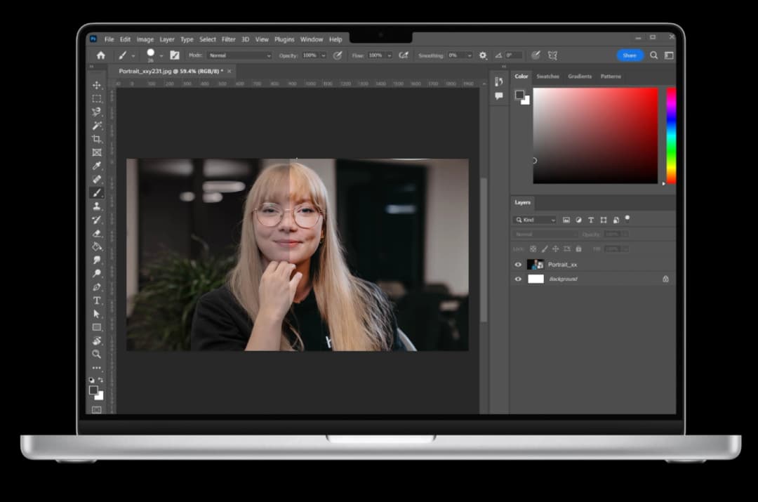 Photo editing on a laptop: color and exposure correction of a portrait photo